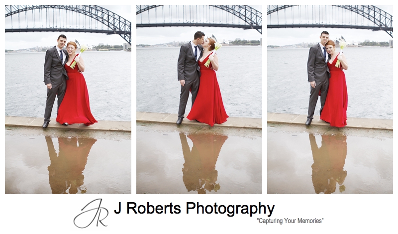 Couple reflected in rain puddle on sydney harbour - sydney wedding photography 